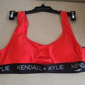 NWT KENDALL + KYLIE RED PEEKABOO LOGO BELT SPORTS BIKINI TOP SIZES S, M